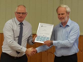 SALC's Jim Friend presents the Parish Council Chairman with the Foundation Certificate under the Local Council Award Scheme.