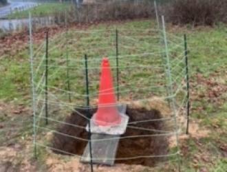 Village Sign hole